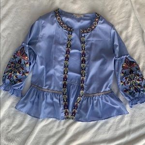 Open blouse with embellished sleeves